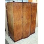 An Art Deco burr walnut wardrobe. Circa 1930. W152cm D60cm H182cm