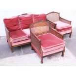 A three piece bergere suite. Early 20th century