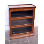 A sectional bookcase. W87cm D26cm H29cm