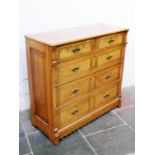 A Victorian ash aesthetic style chest of drawers. Circa 1890. W124cm D48cm H115cm