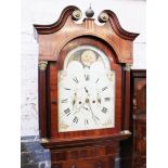 A Georgian mahogany eight day long case clock, rolling moon dial and decoratied with birds. Jn.