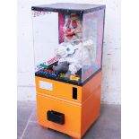 A novelty clown toy dispensing machine. H142cm