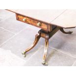 A Regency mahogany Pembroke table with drawer, the brass knobs having lion faces. L91cm