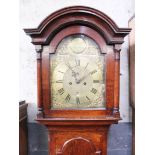 A Georgian oak eight day long case clock, the brass dial with ornate brass mouldings. Hugh Gordon