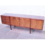 A McIntosh rosewood sideboard. W205cm D45cm H75cm