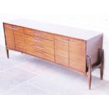 A teak sideboard. Circa 1960. W195cm D45cm H76cm