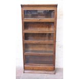 An oak sectional bookcase. Early 20th Century. W87cm D33cm H187cm