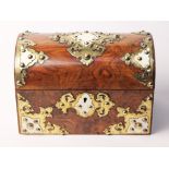 A 19th century walnut domed tea caddy with gothic style gilt brass and ivory mounts. L23cm