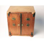 An oak smokerÕs cabinet. Late 19th Century. H32cm