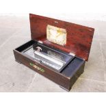 A Swiss 12 Airs Fortissimo music box. L67cm
 
Condition - appears to be in working order, all