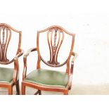 A pair of mahogany armchairs
