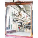 A large Victorian Aesthetic style burr walnut ebonised and gilt over mantel mirror with geometric