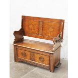 An oak Monks bench, early 20th Century. L112cm