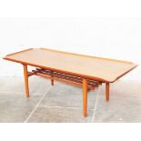 A Danish two tier teak coffee table. L143cm