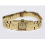 A ladies 9ct gold Bueche-Girod wristwatch. Gross wt.26.1g