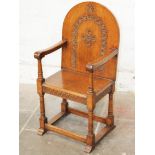 An oak chair circa 1920. H106cm