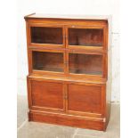 A sectional bookcase. H118cm