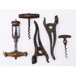 A group of five corkscrews comprising an army issue direct pull, a German corkscrew with crossover
