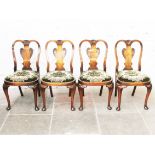 A set of four walnut chairs circa 1930. H91cm