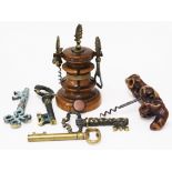 Four novelty "key" corkscrews, a wooden handled corkscrew and a turned wood bar companion stand