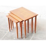 A Danish teak nest of tables