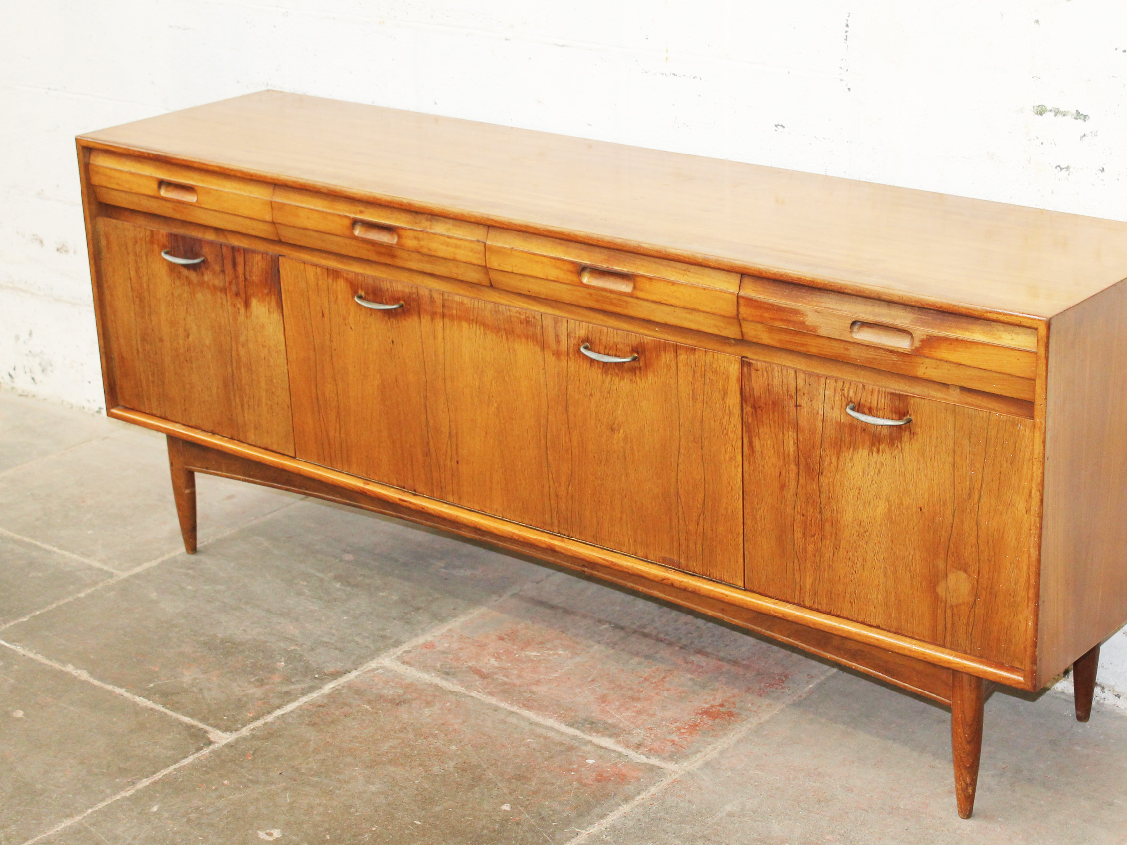 A teak and rosewood sideboard circa 1960. W187cm D47cm H77cm - Image 2 of 2