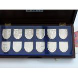 The Royal Arms twelve silver crest set. Approx. wt. 15oz