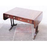 A Regency mahogany sofa table. W103cm D69cm H73cm