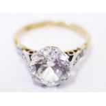 An 18ct gold platinum ring. Gross wt. 4g. Size N