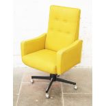 A Matthews mustard yellow retro office chair having black base and chrome castors. H116cm