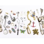 A mixed lot of jewellery to include a 9ct gold pendant, a silver coin on chain and other jewellery