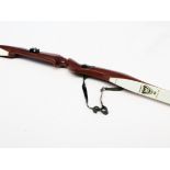 A Knight bow with soft case. Condition - good, general wear to include minor marks and scratches