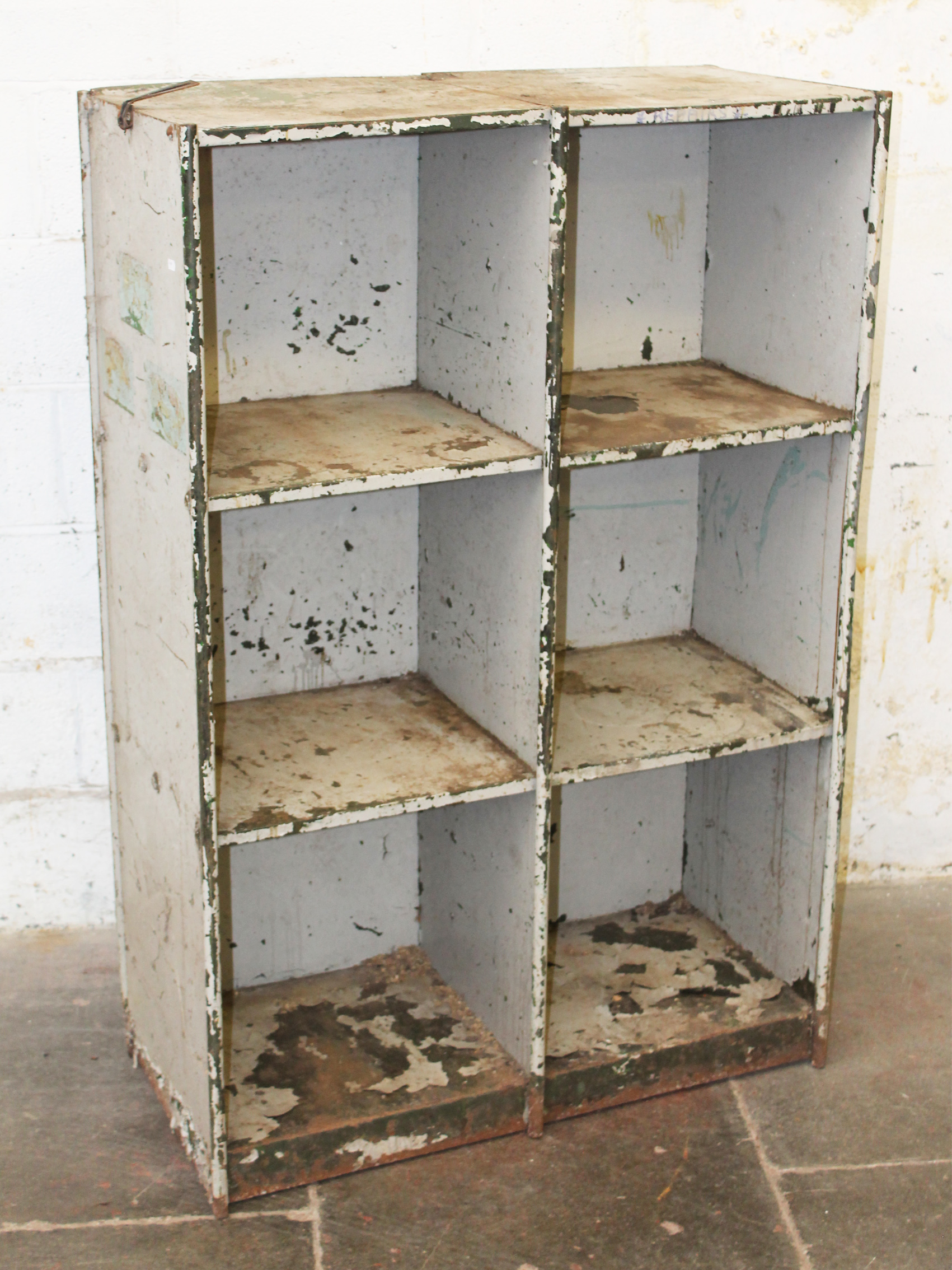 An industrial antique metal cubbyhole storage cabinet. W94cm D46cm H140cm