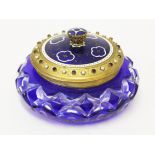 A Bohemian blue flash cut glass dish with enamelled and gilt metal lid. Diam. 13.5cm. Condition -
