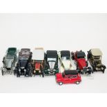 A group of eight Franklin Mint model cars. Condition - a few models appear to have pieces missing.