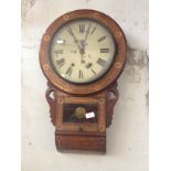 A 19th Century drop dial wall clock. L68cm