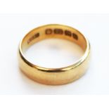 A 22ct gold wedding band. Wt. 5.7g. Size I