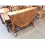 A Victorian burr walnut Sutherland table. L83cm