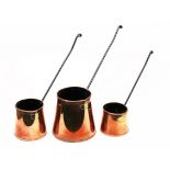 A group of three graduated copper cider ladles. Condition - good, no damage/repair, general wear