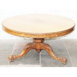 A Gillows oak breakfast table circa 1850 having pedestal base with gothic panels and acanthus scroll