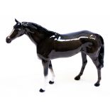 A Beswick race horse. L35cm. Condition - chip to ear otherwise ok, no further damage nor any