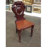 A 19th Century mahogany hall chair. H91cm