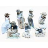 A group of six Nao figures and one Lladro figure (girl with lamb). Condition - Nao figure girl