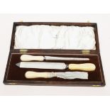 A Walker & Hall ivory handled and silver mounted carving set in oak box. Condition - good, appears