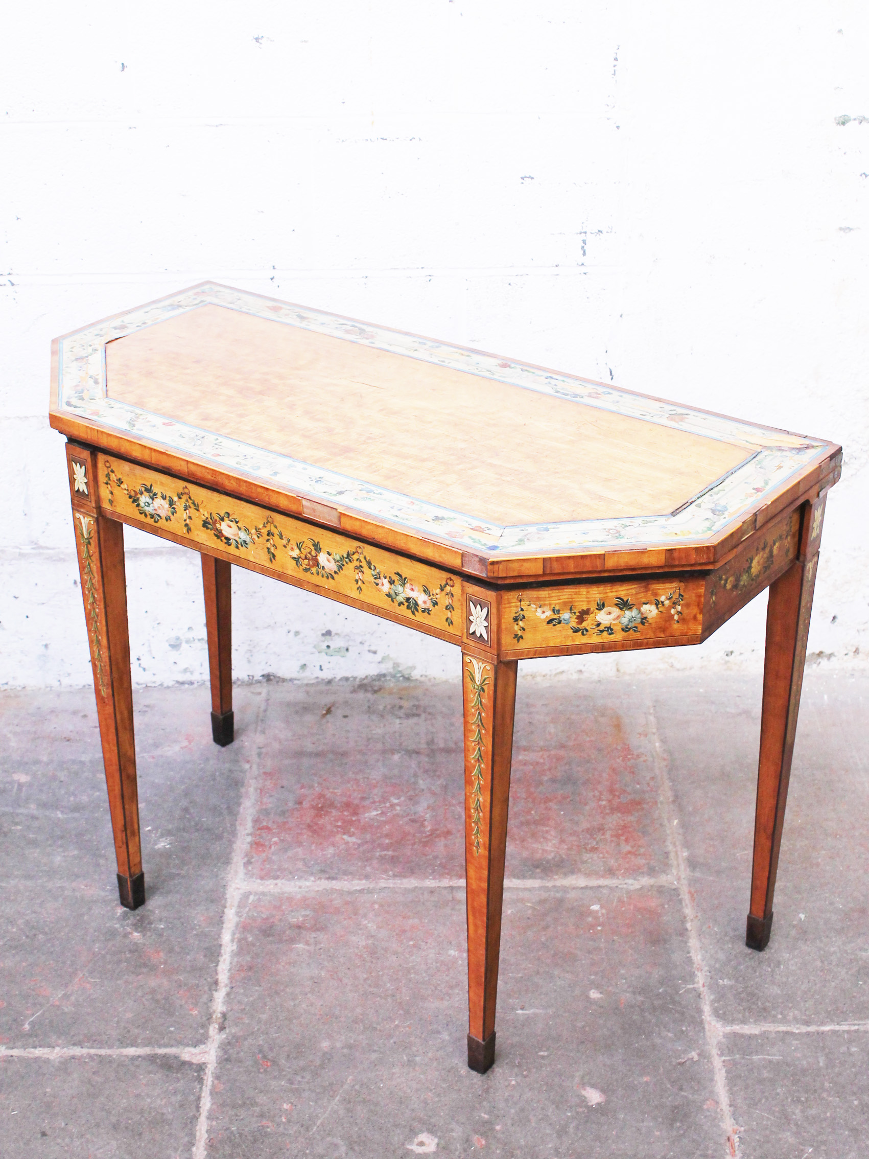 A Sheraton style painted and crossbanded satinwood fold top card table circa 1800. W97cm D45cm H73cm