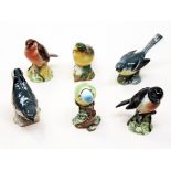 A group of six Beswick birds. Condition - beak restored on robin, otherwise ok, general wear only.