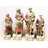 A group of four Royal Dux shepherd figures. Tallest 65cm. Condition - the head has been off and