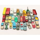 A quantity of Dinky Toys, Corgi Toys and Matchbox toy vehicles. Condition - general very play