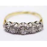 An 18ct gold and platinum five stone diamond ring. Approx. diamond wt. 0.85 carats. Gross wt. 3.