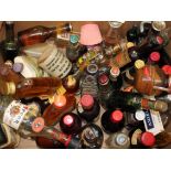 A quantity of alcoholic miniatures. Condition - a couple of empty bottles, generally a little